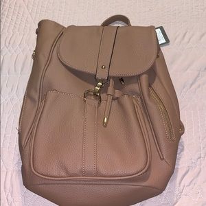 Brand new dusty pink bagpack/purse